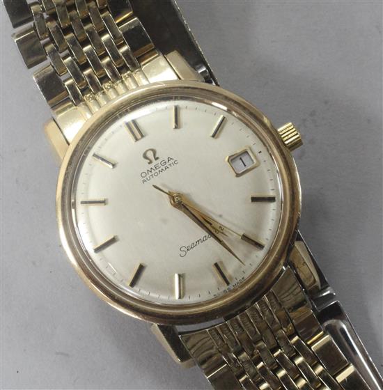 A gentlemens 1960s 9ct gold Omega automatic Seamaster wrist watch, on gold plated Omega bracelet,